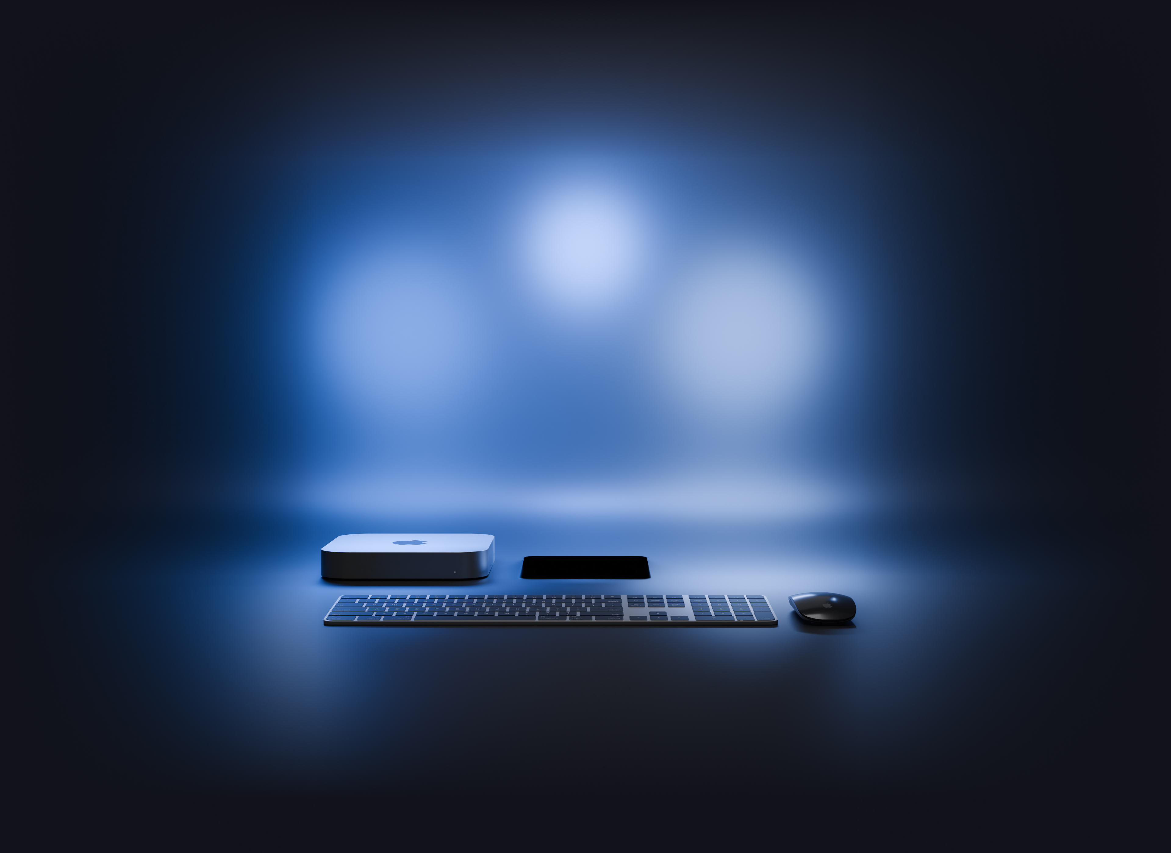 An office desk lit with smart lighting matching a starry rainforest at night